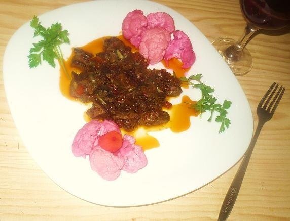 Friptura de vitel in sos negru