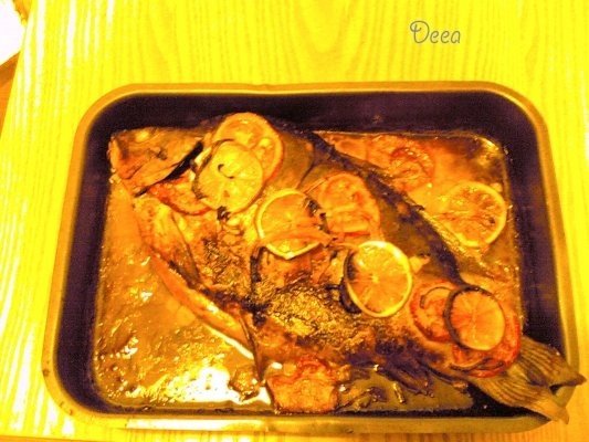 Crap la cuptor cu legume