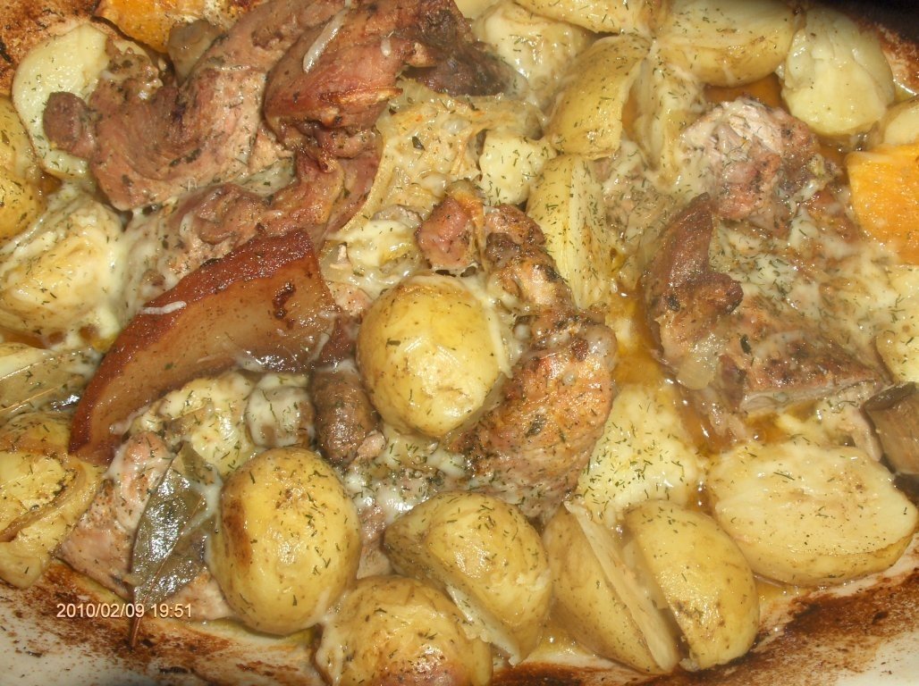 Muschi de porc la cuptor in sos de portocale si vin(reteta proprie)