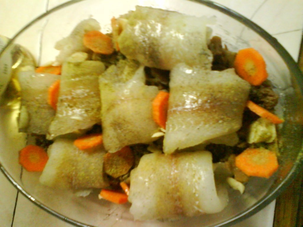 File de pangasius rulat pe pat de ciuperci