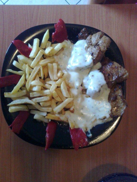 Friptura de porc cu cartofi si sos bechamel