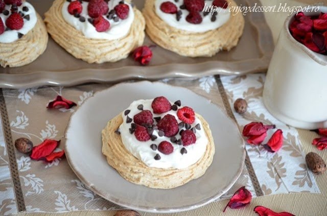 Raspberry & hazelnut meringue nests