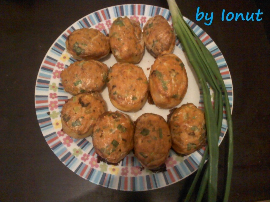 Cartofi umpluti cu hering, la cuptor