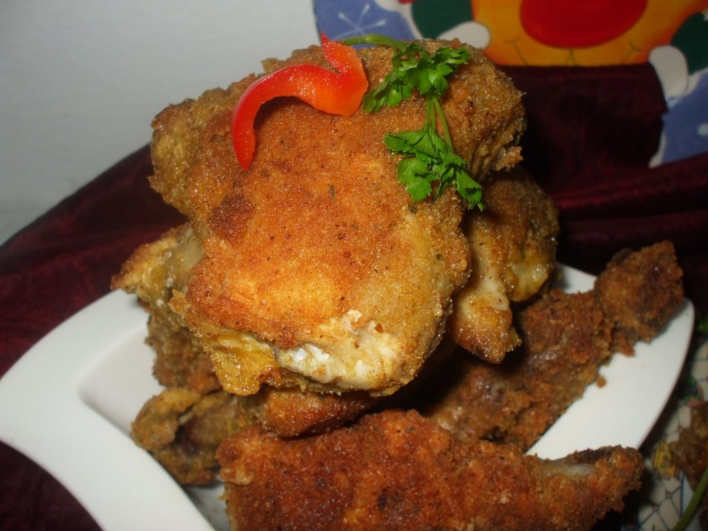 Pui pane cu pesmet si garnitura de spanac picant