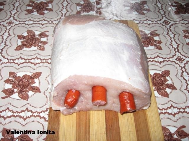 Cotlet de porc fara os  impanat cu carnaciori