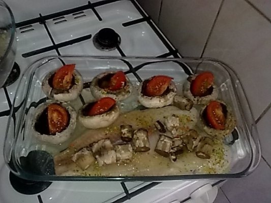 Pangasius cu ciuperci la cuptor