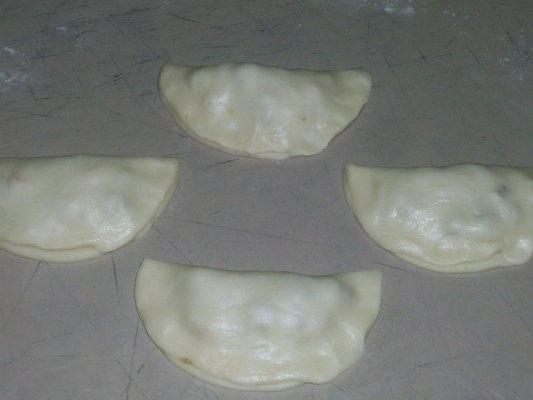 Sambusek(placinte prajite;specific arab)