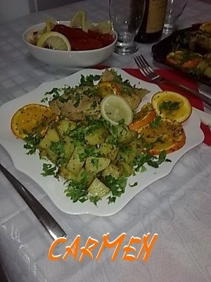 Copane de curcan cu citrice si cartofi natur