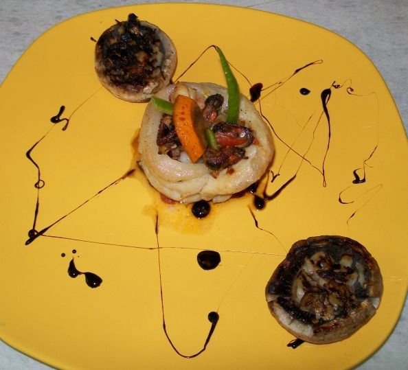 Manson de Pangasius cu fructe de mare, sos de citrice si ciuperci la gratar