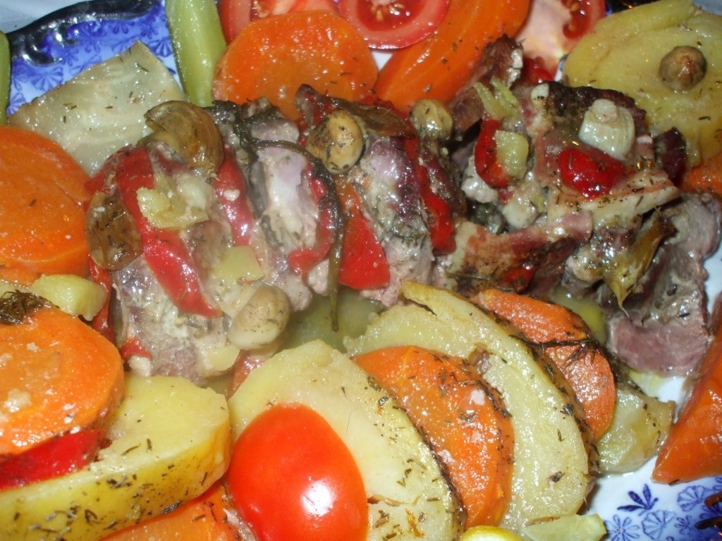 Muschi la tava cu legume