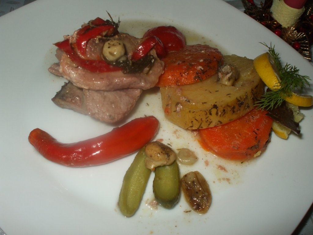 Muschi la tava cu legume