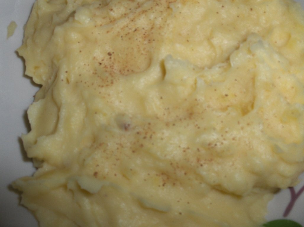 Calamari  umpluti  cu sos de vin (Lulas recheadas)