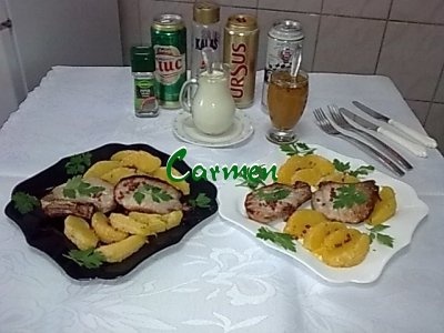 Cotlete de porc cu felioare de portocale