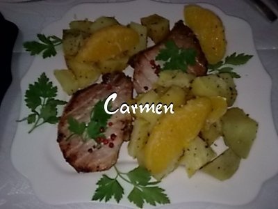 Cotlete de porc cu felioare de portocale