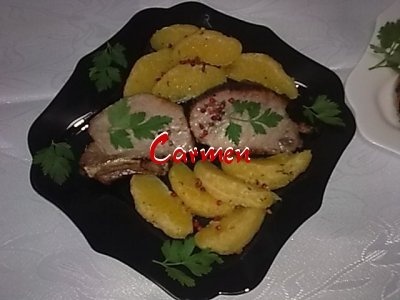 Cotlete de porc cu felioare de portocale