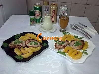 Cotlete de porc cu felioare de portocale