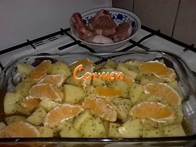 Cotlete de porc cu felioare de portocale