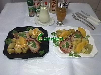 Cotlete de porc cu felioare de portocale