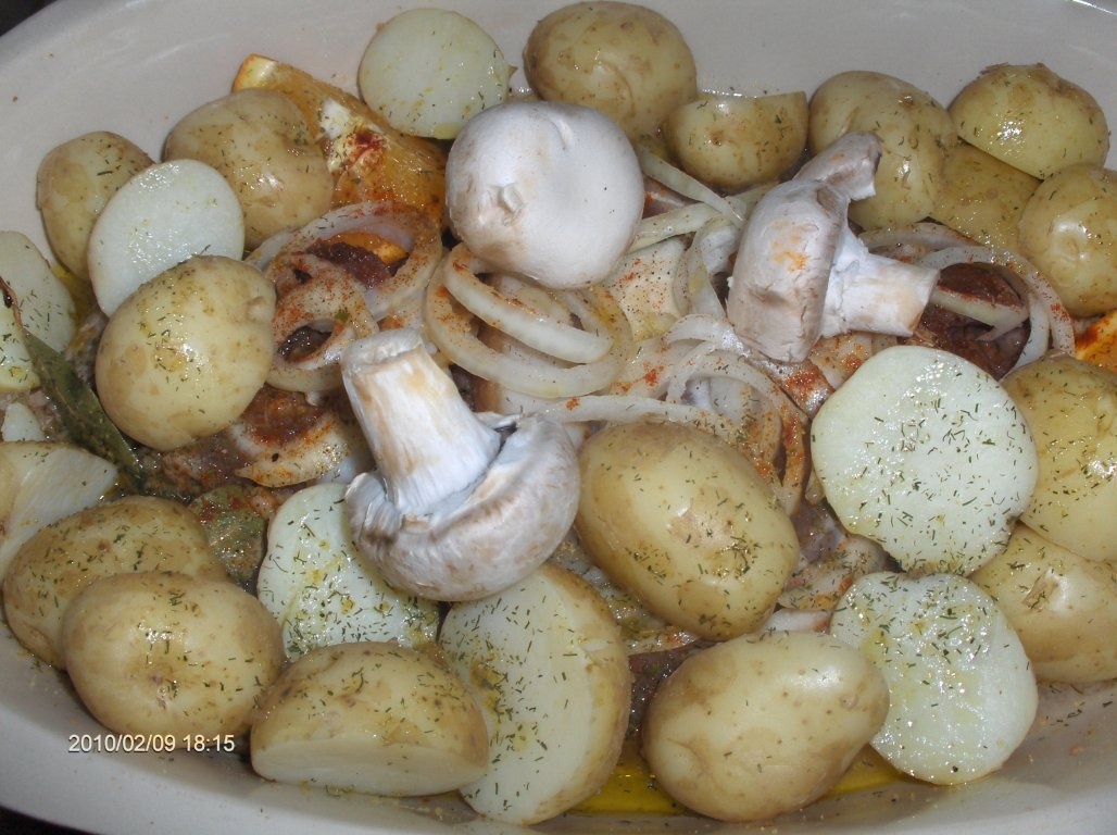 Muschi de porc la cuptor in sos de portocale si vin(reteta proprie)