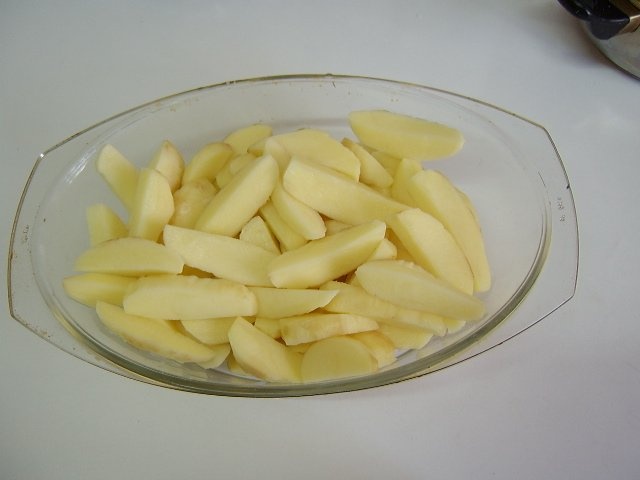 Cartofi noi la cuptor cu branza