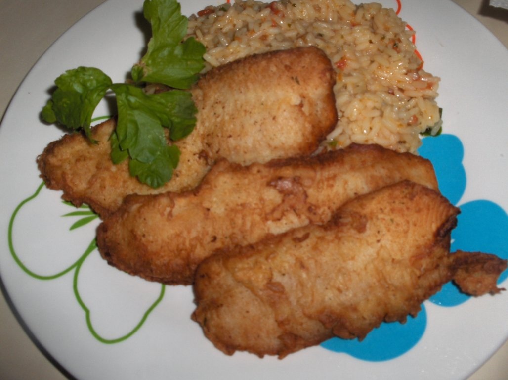 Filete de Merluccius cu orez de rosii (Filetes de Pescada c/ arroz de tomate)