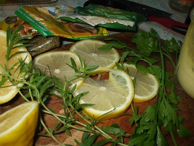 File de pangasius cu rosii la tava