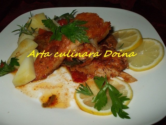 File de pangasius cu rosii la tava