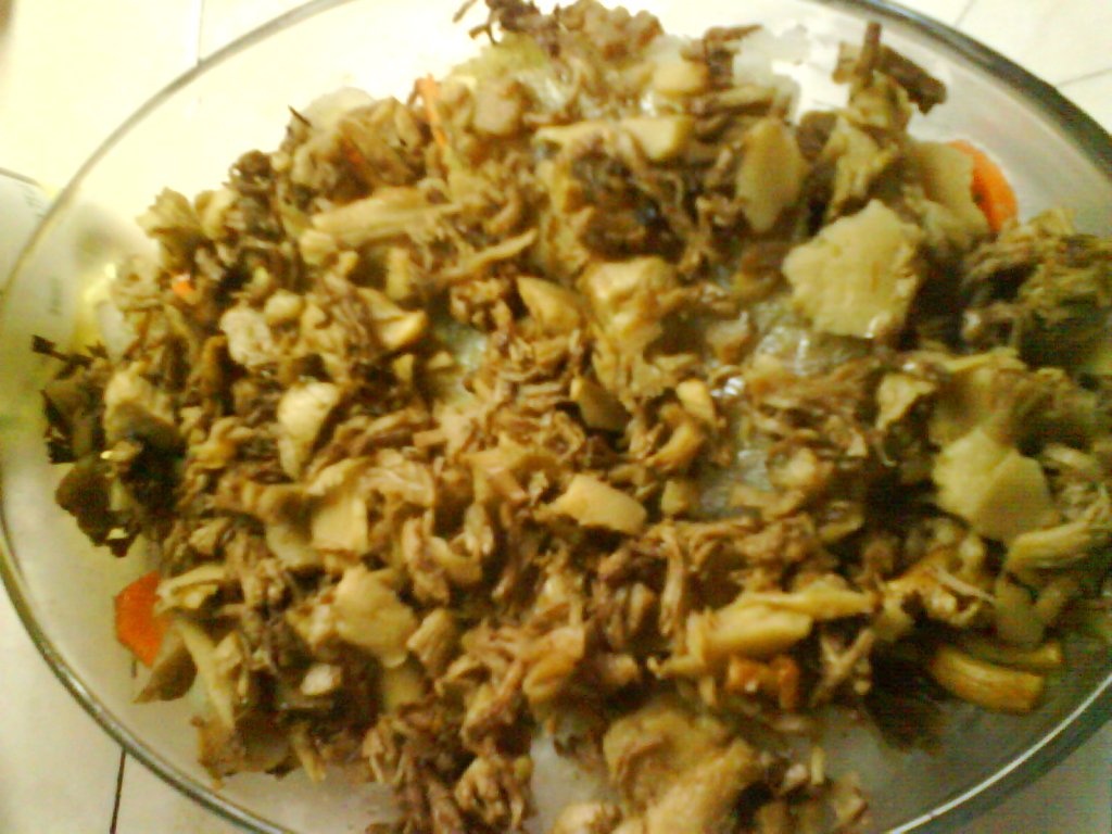 File de pangasius rulat pe pat de ciuperci