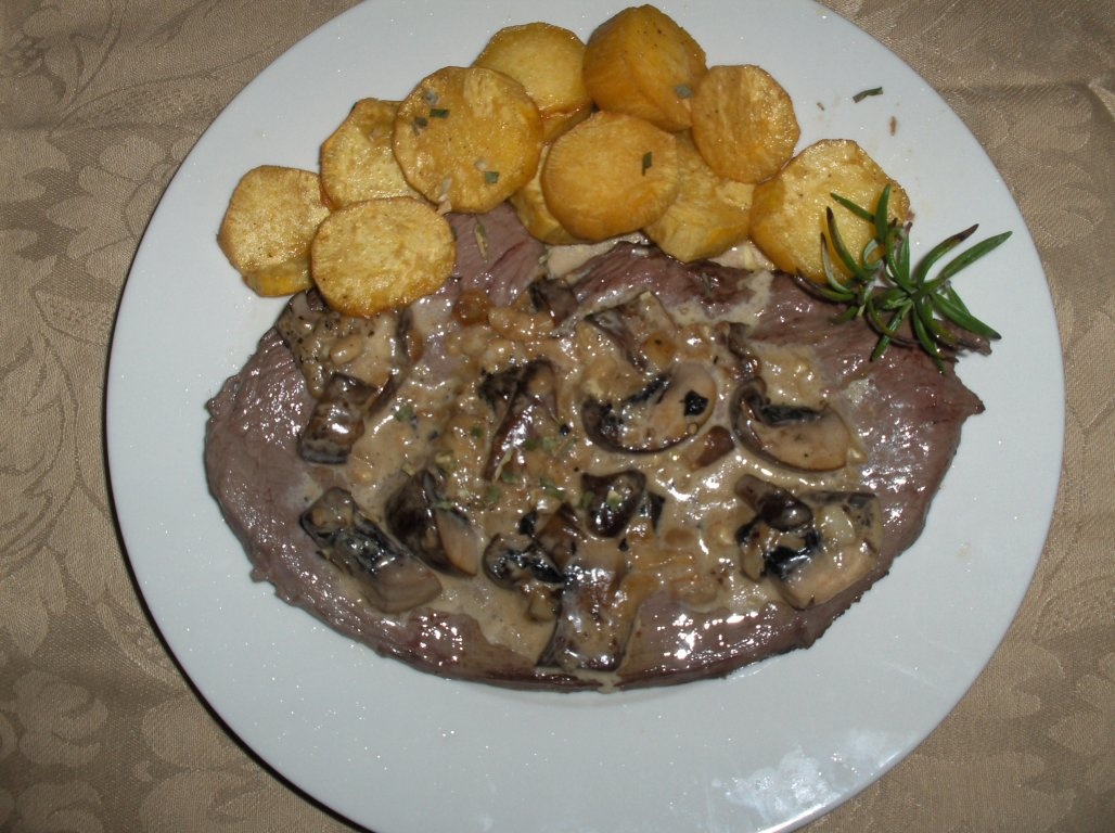 Snitele de vacã în sos de wiskey (Bifes de Vitela com Molho de Uísque)