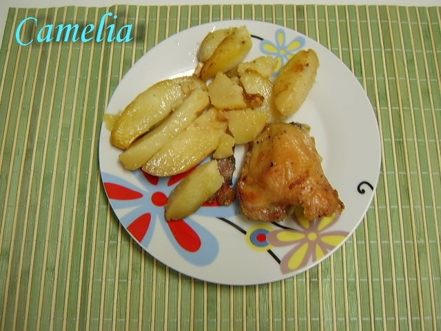 Friptura de pui cu cartofi la cuptor