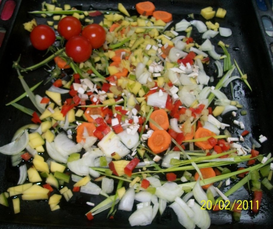 Dorada umpluta pe pat de legume