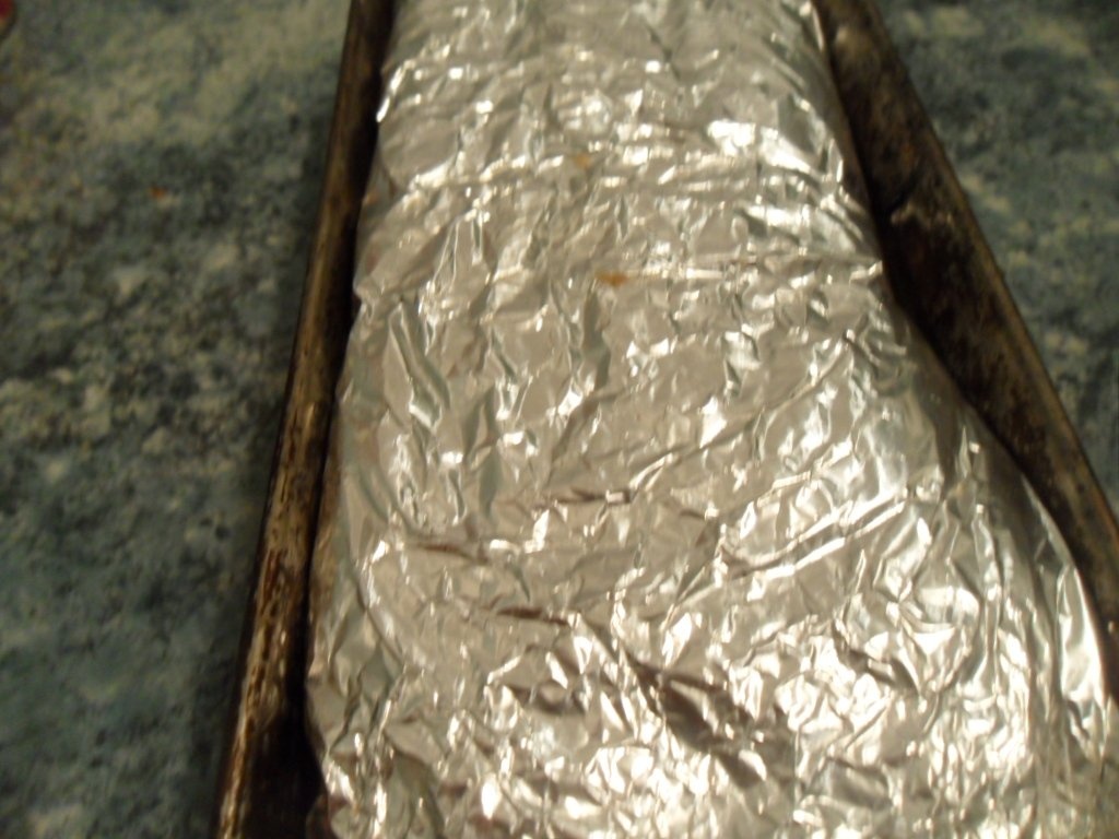 Rulada de carne tocata cu spanac si rosii cu garnitura de legume sote