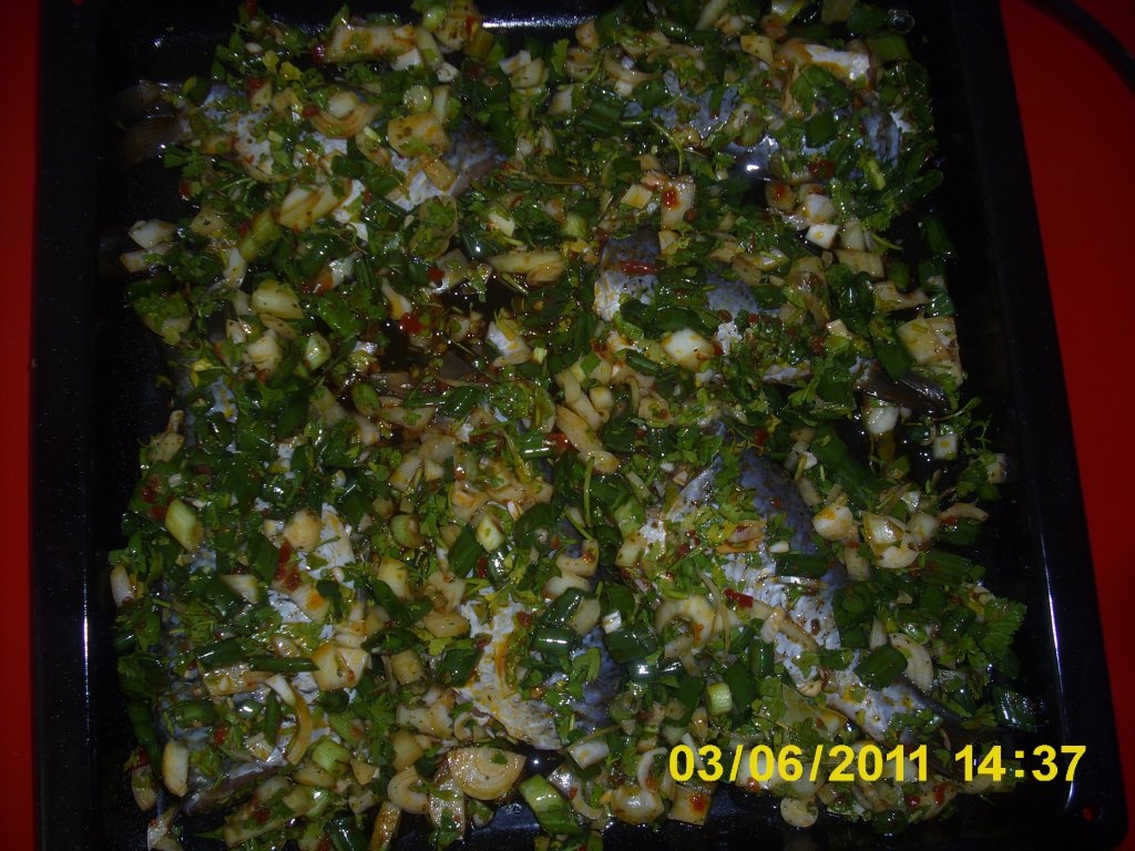 Peste la cuptor cu garnitura de orez