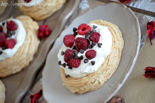 Raspberry & hazelnut meringue nests