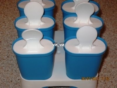 Inghetata de cacao cu fulgi de migdale pe bat