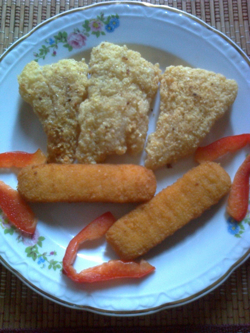 File de cod cu crusta de malai aromat cu usturoi .