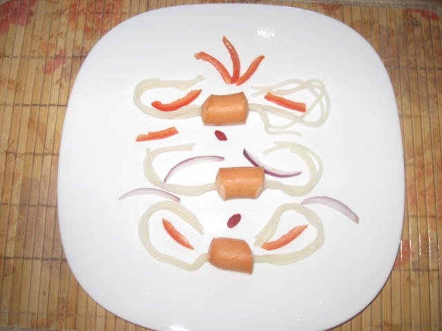 Crenvuşti " dantelaţi " din piept de pui  cu spaghete