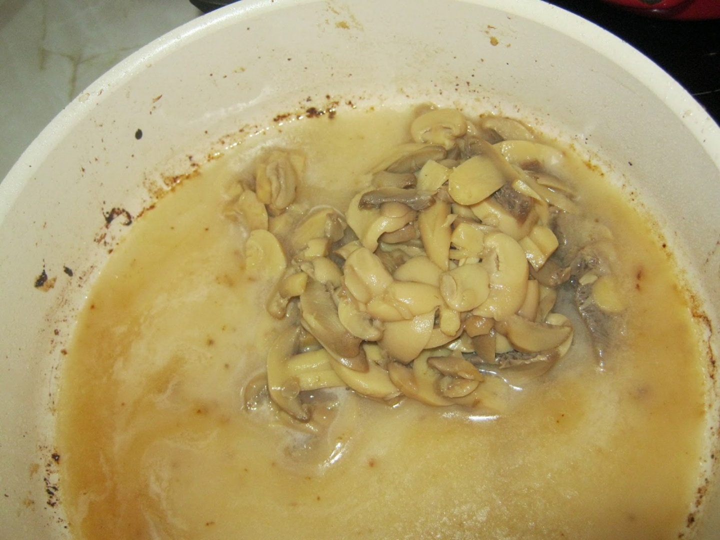 Cotlet de porc a la grec cu ciuperci si cus-cus