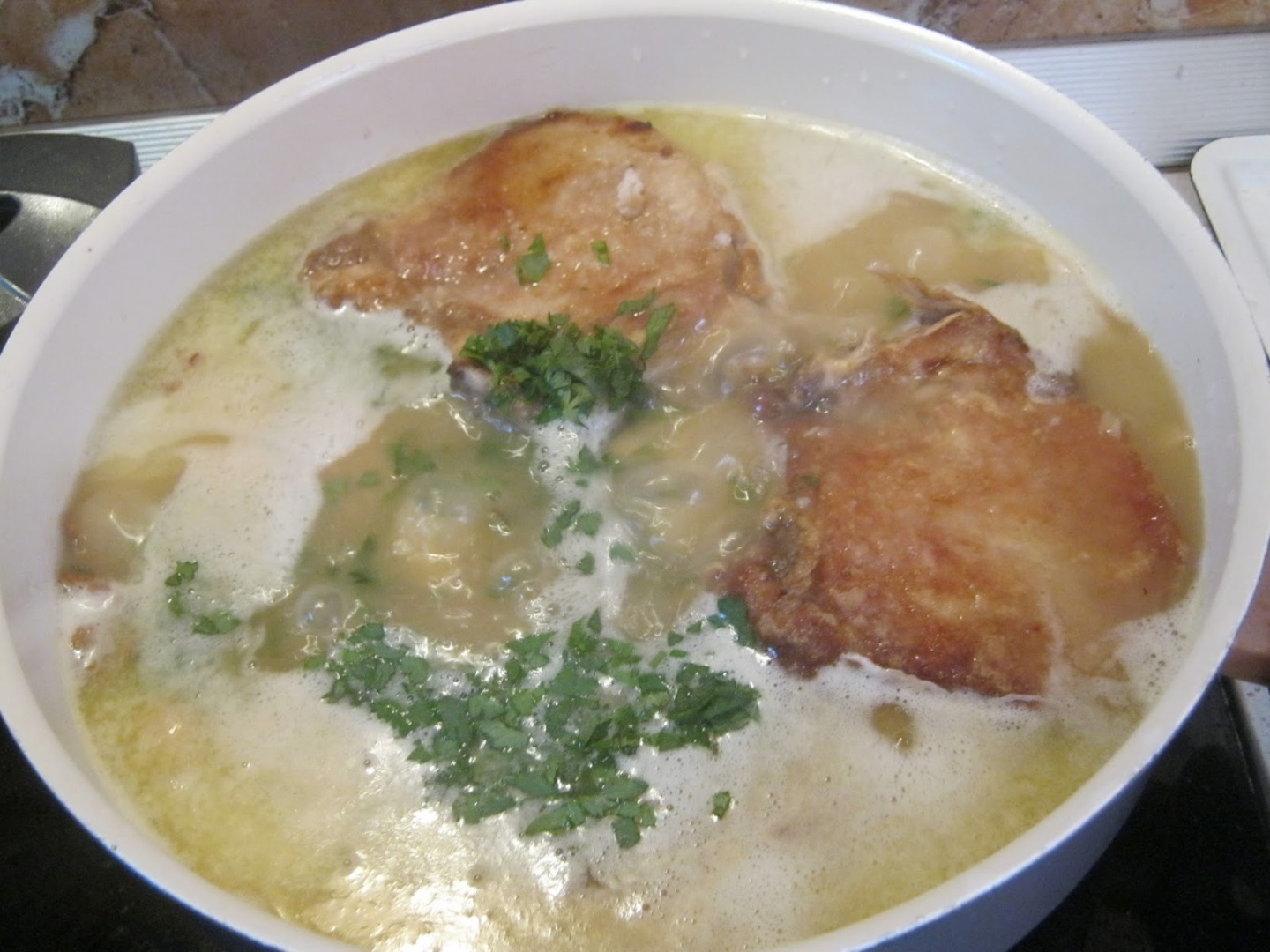 Cotlet de porc a la grec cu ciuperci si cus-cus