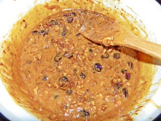 Napolitane cu nuca,stafide,rahat,merisoare ,glazurate cu crema de cacao