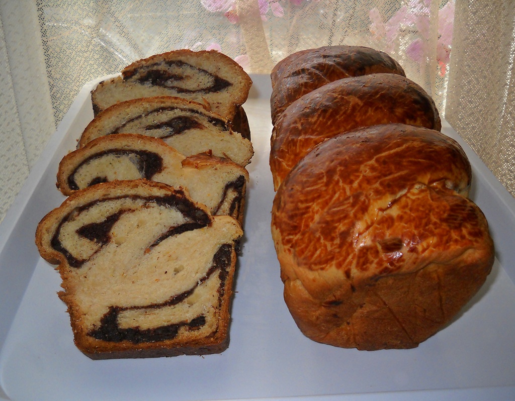 Cozonac pufos cu nuca, cacao si aluat oparit. O reteta simpla si delicioasa, cu un rezultat grozav