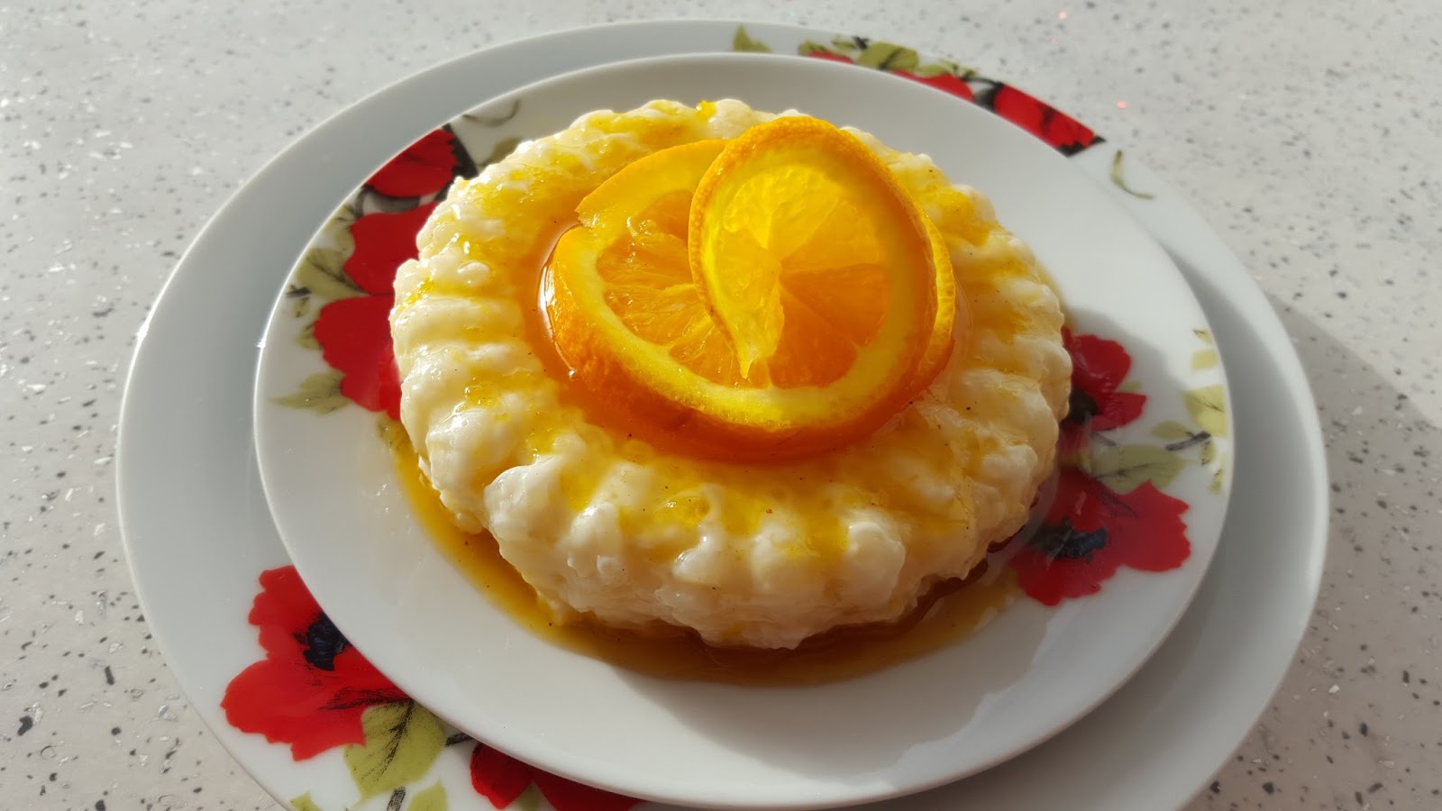 Orez cu lapte si topping de portocale