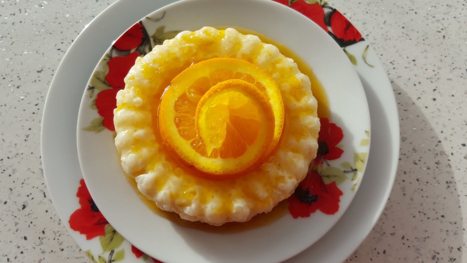 Orez cu lapte si topping de portocale