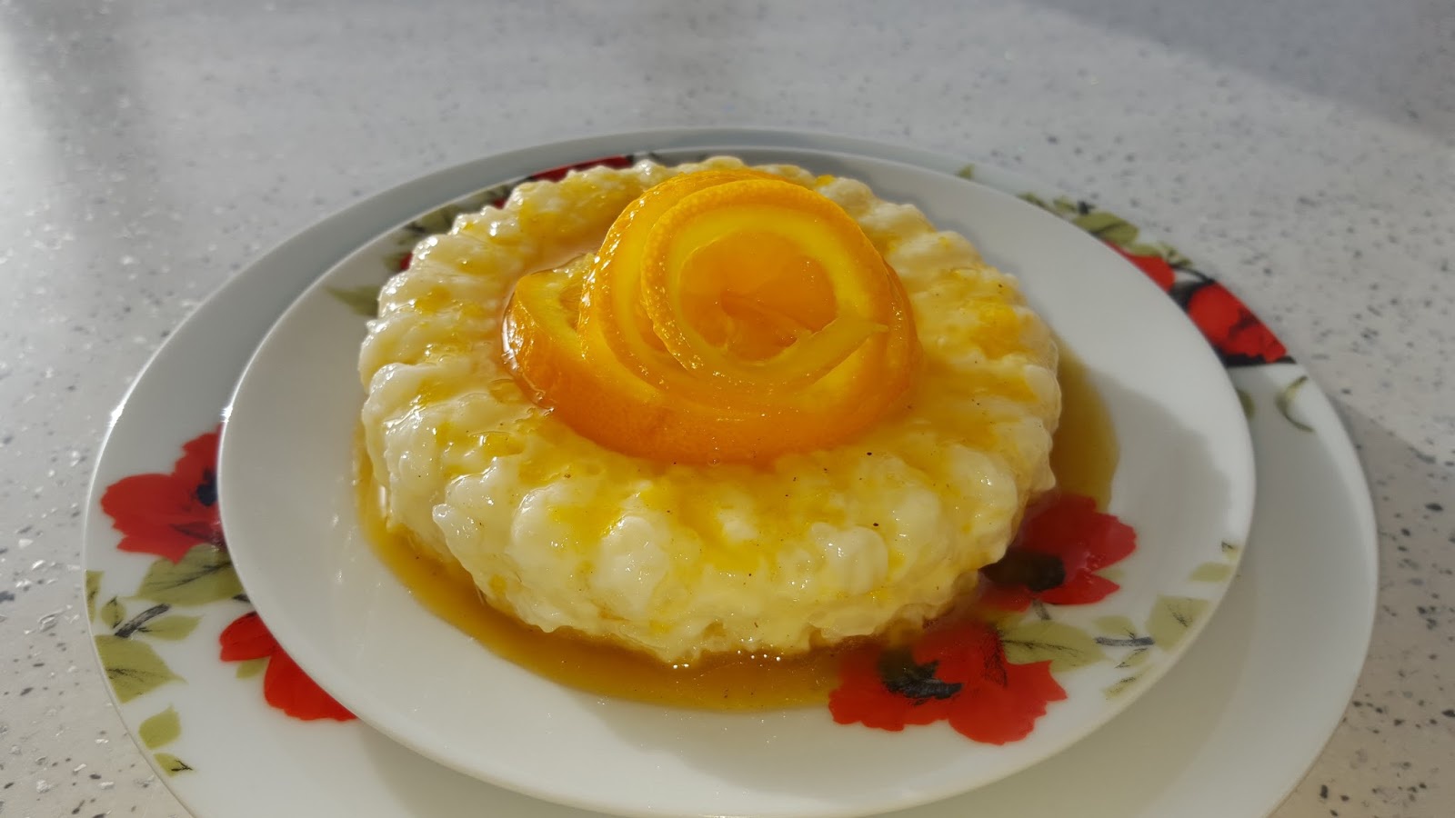 Orez cu lapte si topping de portocale