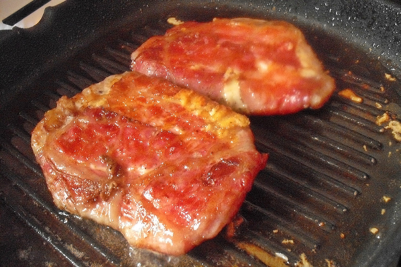 Muschi in prapur de porc, pe gratar