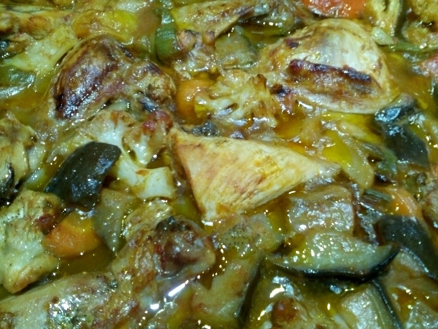 Pui la cuptor pe pat de legume