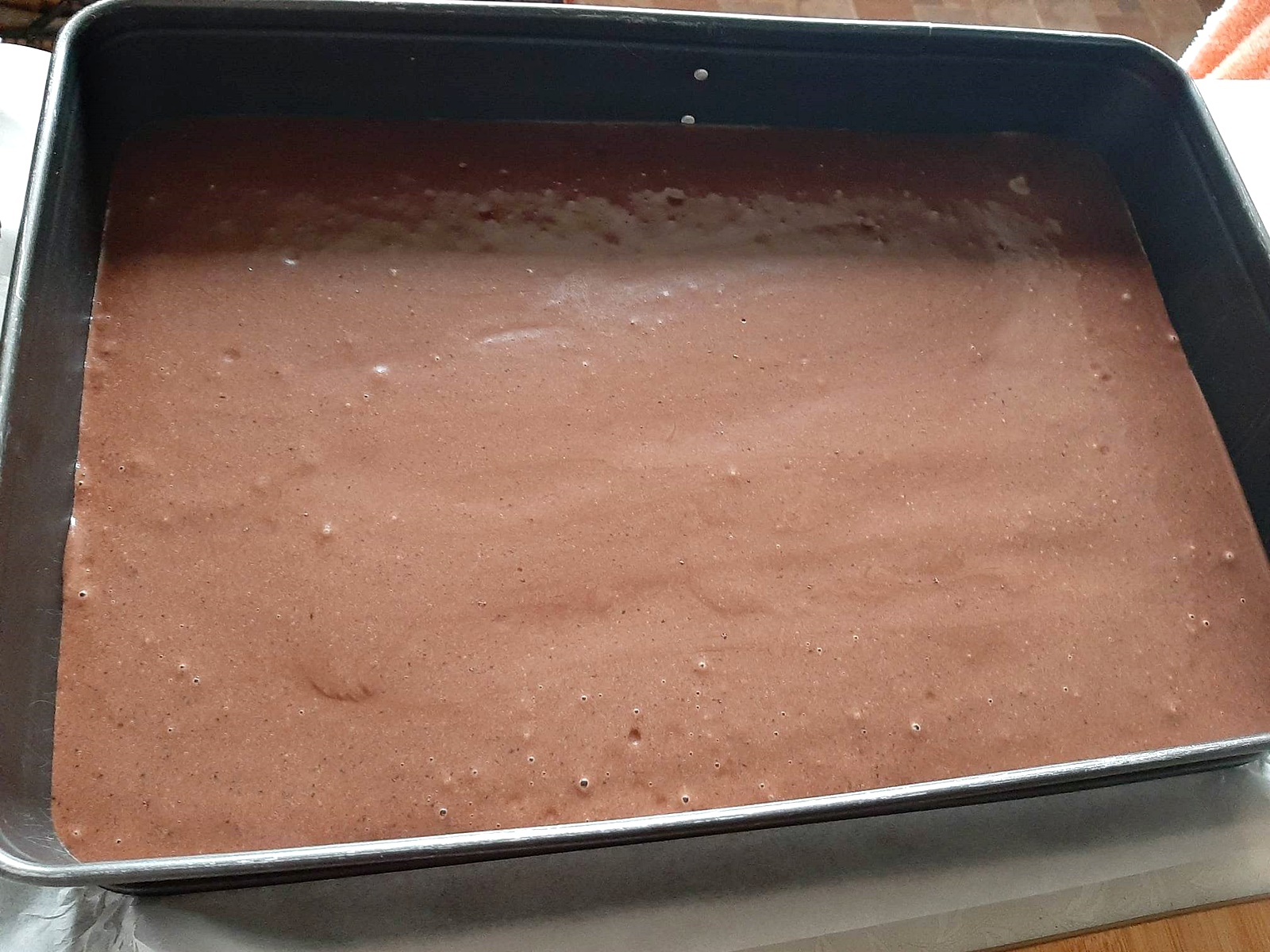 Prajitura Bounty cu crema de cocos, blat umed de cacao si glazura de ciocolata