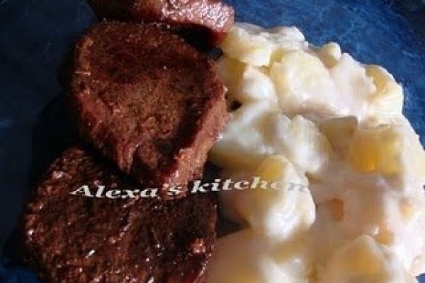 Manzat la tava cu garnitura gratinata