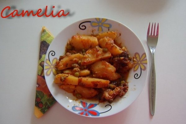 Mancare de cartofi cu carne afumata cu mazare