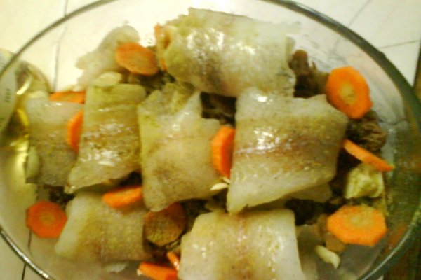 File de pangasius rulat pe pat de ciuperci